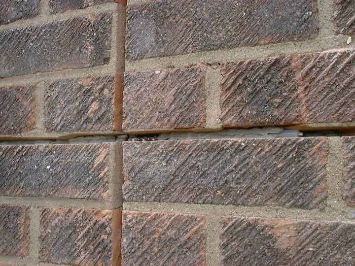 Helifix HeliBar stainless steel helical bars in conjunction with plastic debonding sleeves can be used to create a movement joint in an existing wall.