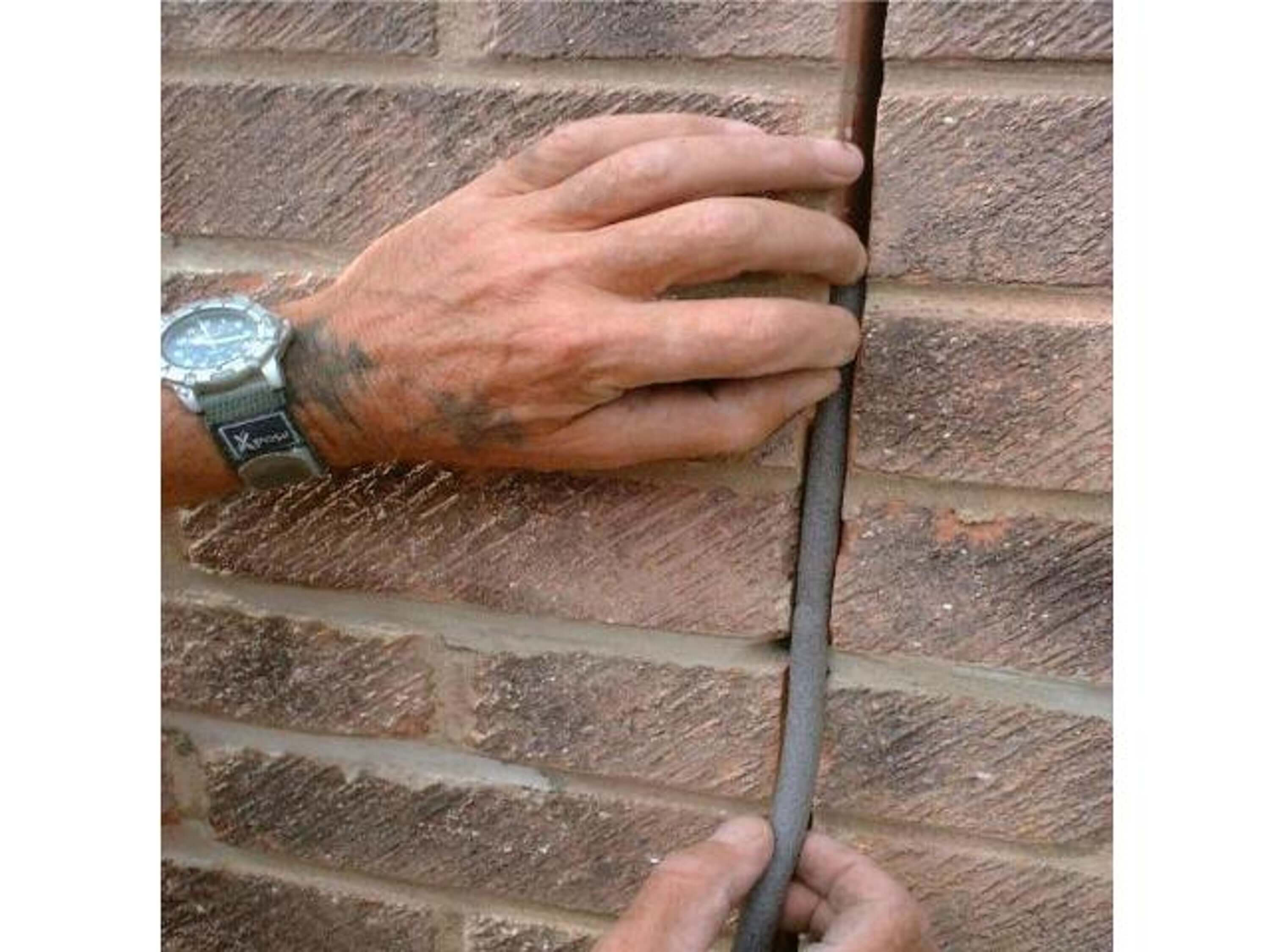 Helifix HeliBar stainless steel helical bars in conjunction with plastic debonding sleeves can be used to create a movement joint in an existing wall.